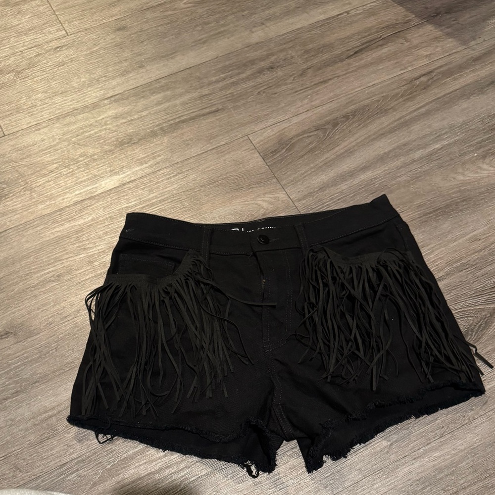Black denim shorts.